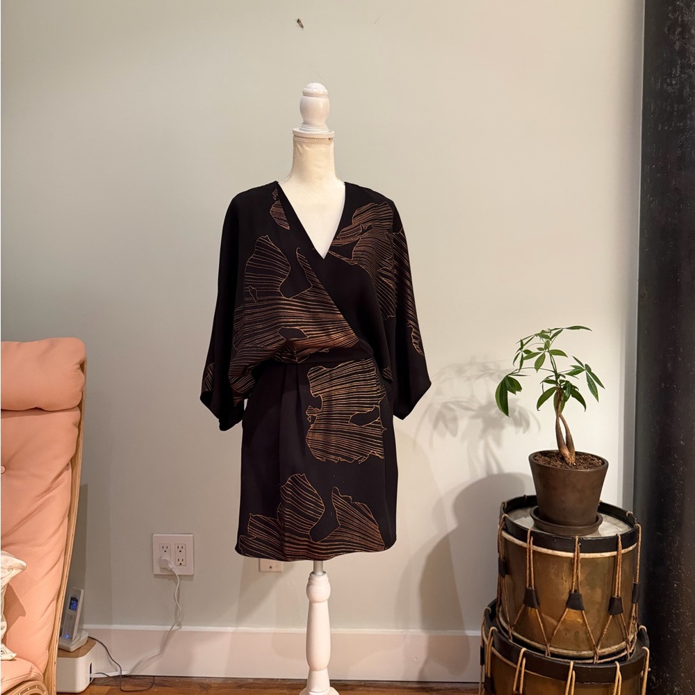 Halston Heritage Black and gold unique mini dress.